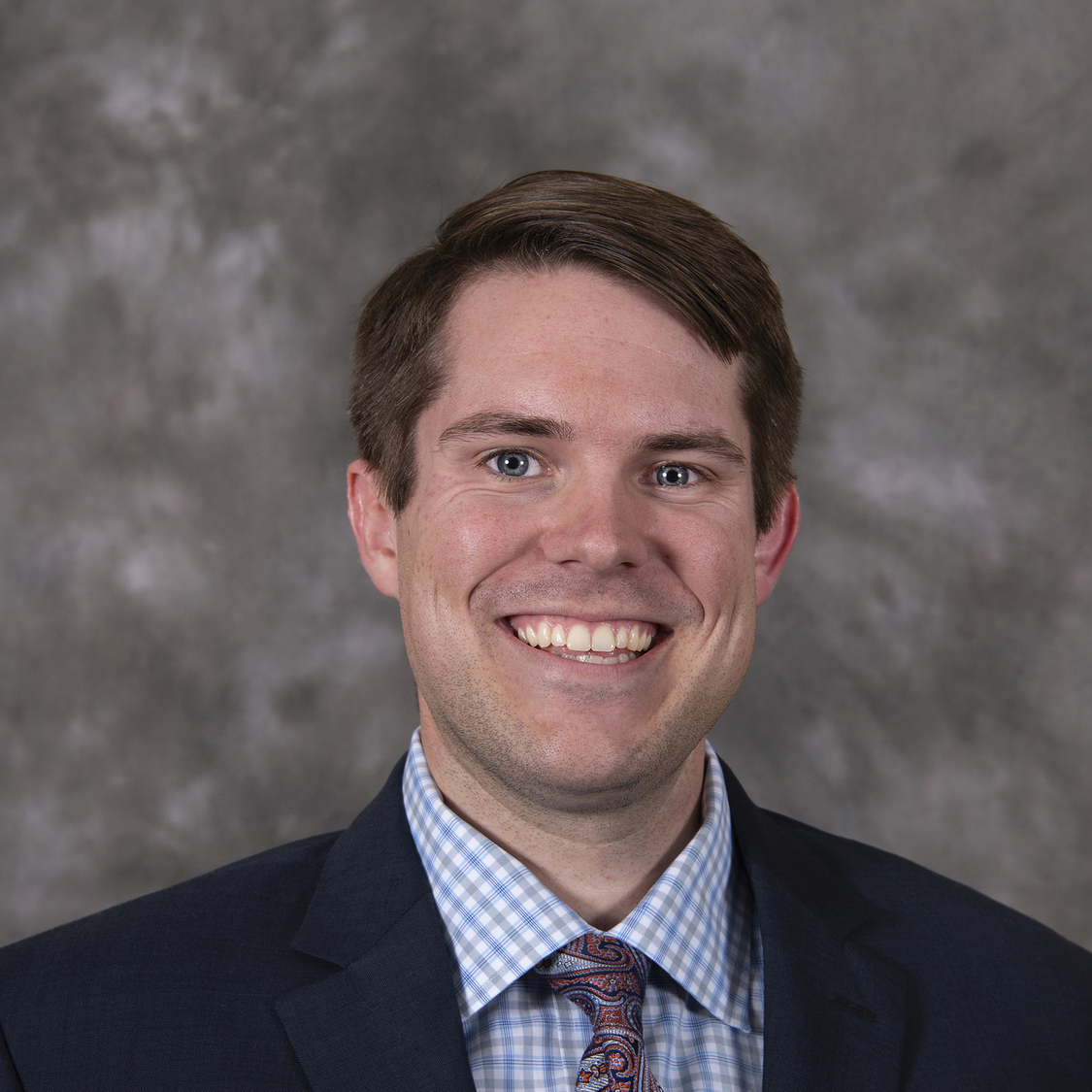 Headshot of Devin Ruster